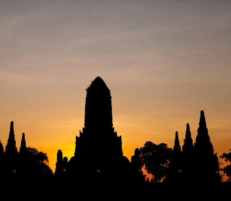 Ayutthaya temple ruins sunset silhouette chedi