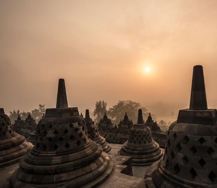 Borobudur temple sunrise mist Indonesia UNESCO site