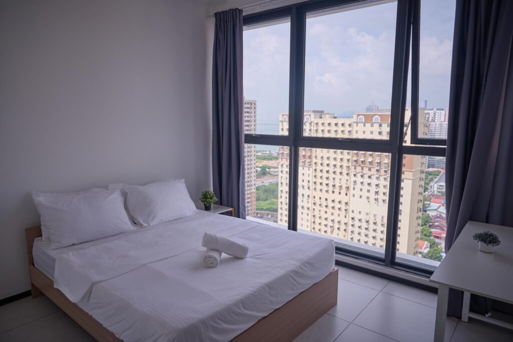 Minimal Budget Airbnb Bedroom with City View and Natural Light