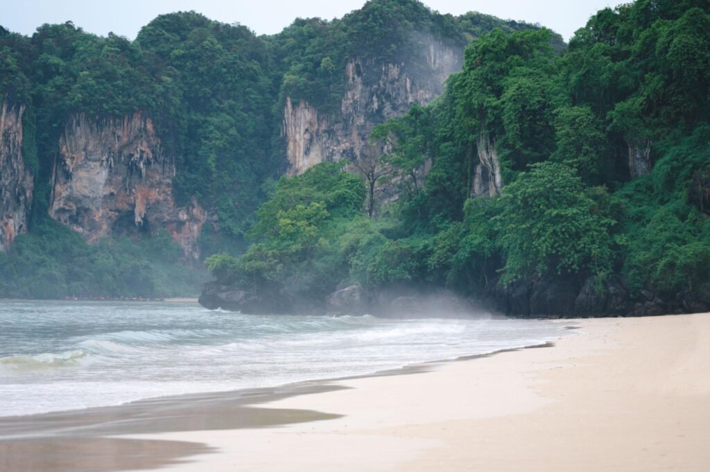 Travel in low season heavy rainy seasonand tropical sea Railay beach with no people in krabi thailand
