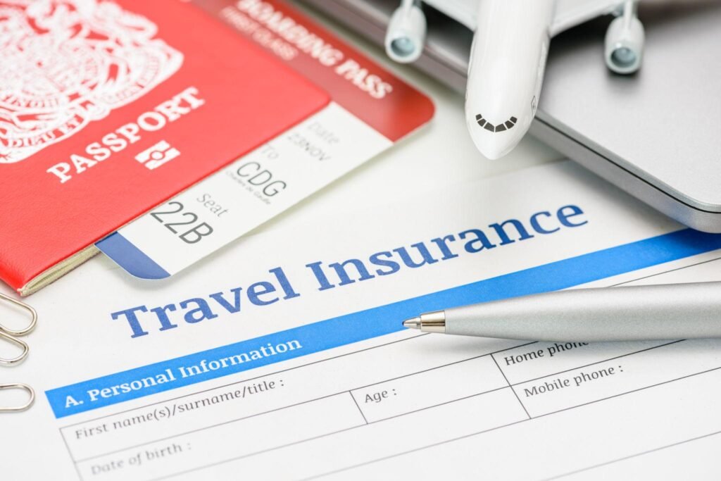 Travel insurance and service concept : Top view of travel insurance application form, a boarding pass, a passport and an air plane. Travel insurance covers costs and losses associated with traveling.