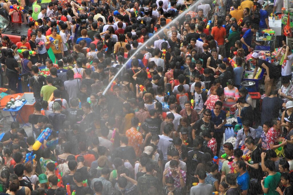 People celebrating the Songkran New Year Festival in Bangkok, Thailand.