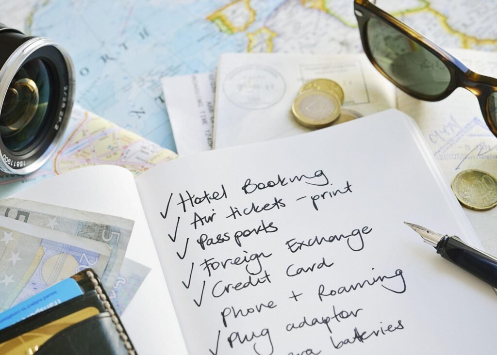 Travel checklist with maps, passport, money etc