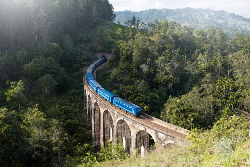 Train arriving at famous Nine arch bridge in Ella, Sri Lanka