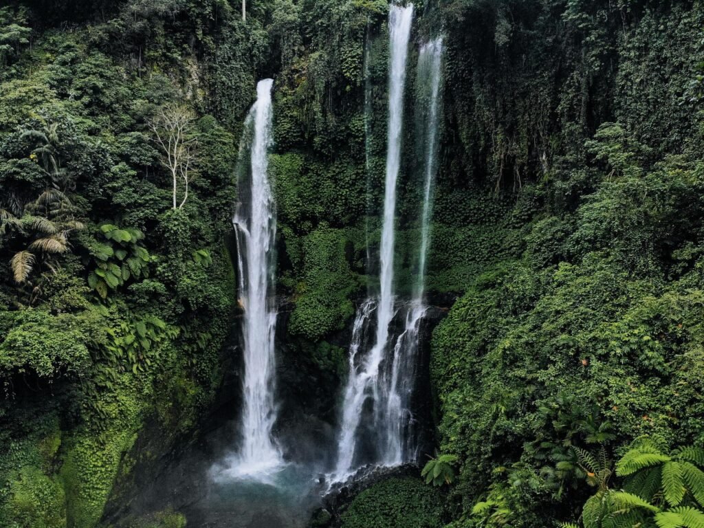 Aerial view of Sekumpul waterfall on Bali island Indonesia - travel and nature background. Drone photo