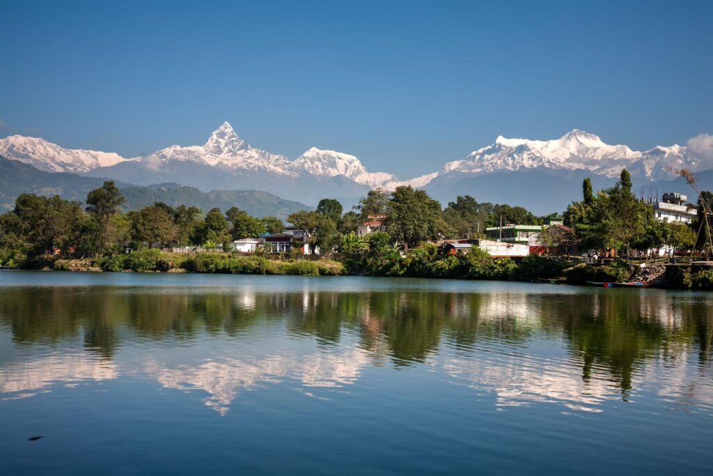 View at Annapurna mountain range and its reflection in Phewa lake in Pokhara, Nepal