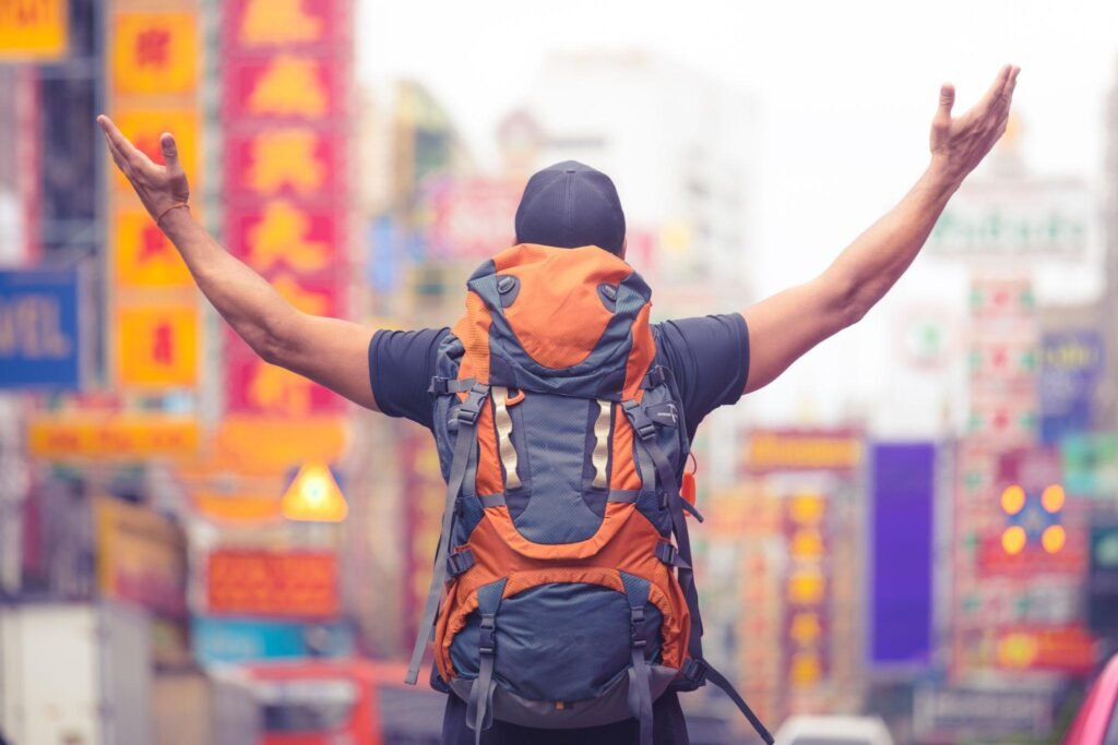 tourist backpacker visiting a city in southeast asia . .