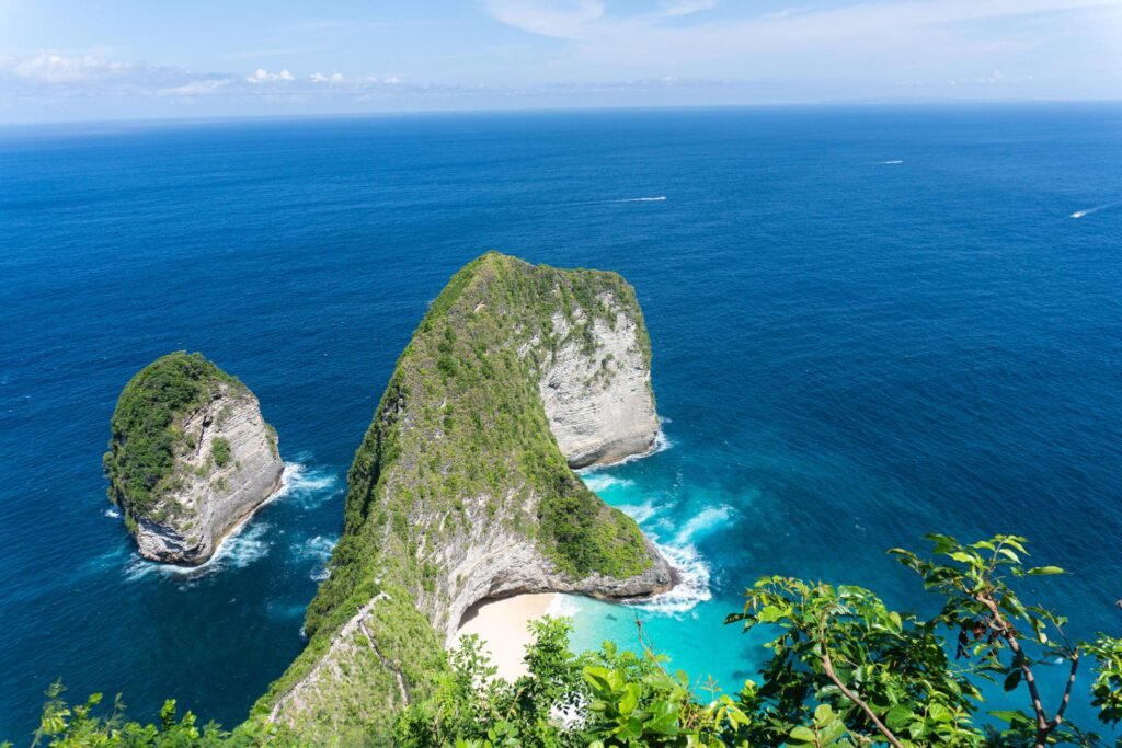 Nusa Penida Cliff Edge Turquoise Waters Greenery with Tropical Paradise.