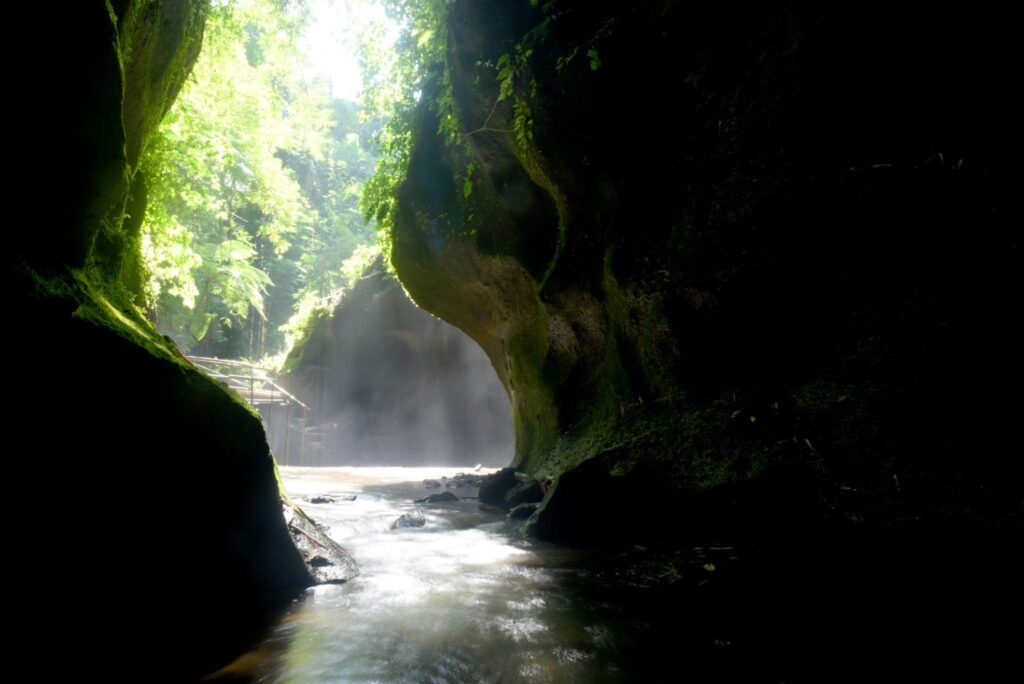 Tukad Cepung Waterfall, at Bangli regency of Bali, with beautiful green nature landscape surroundings