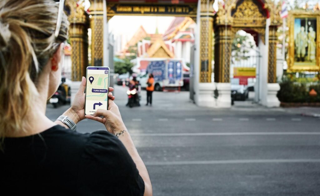 Tourist using navigation app in Bangkok