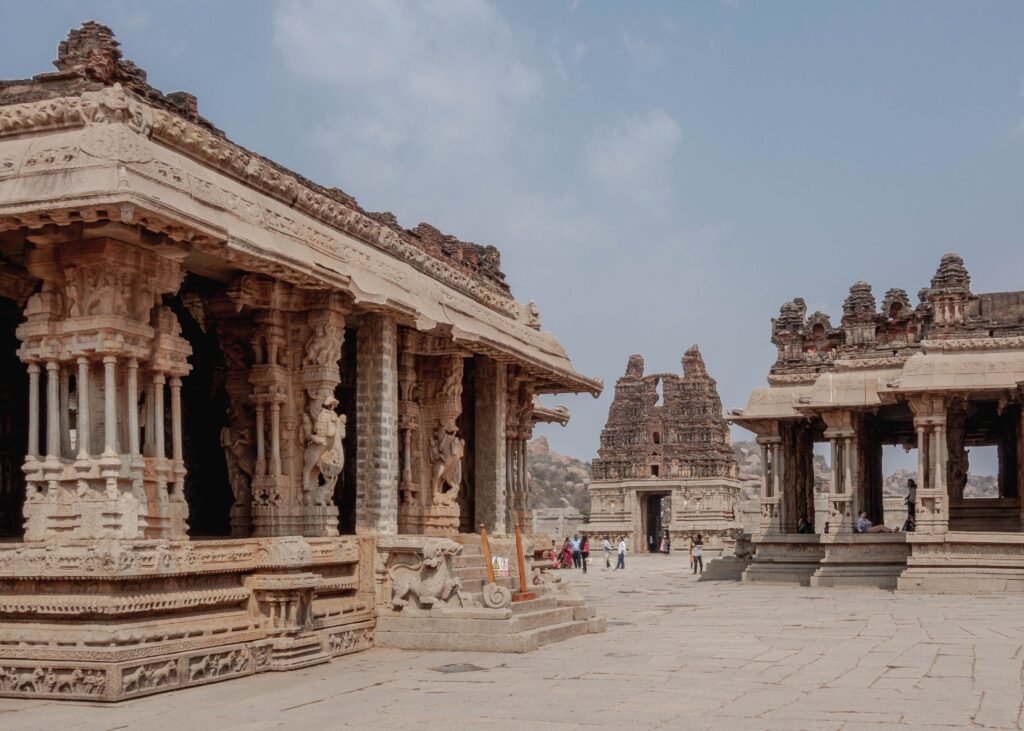 Explore the stunning stone architecture of Hampi's ancient ruins in Karnataka, India.