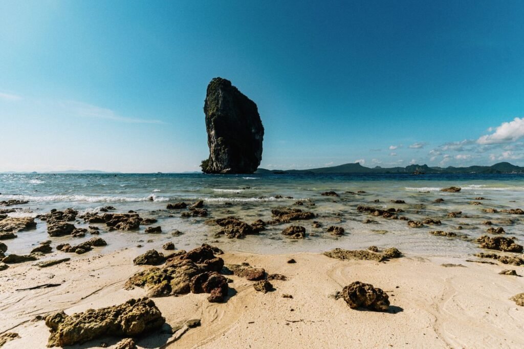 Stunning beach landscape with unique rock formations in Krabi, Thailand.