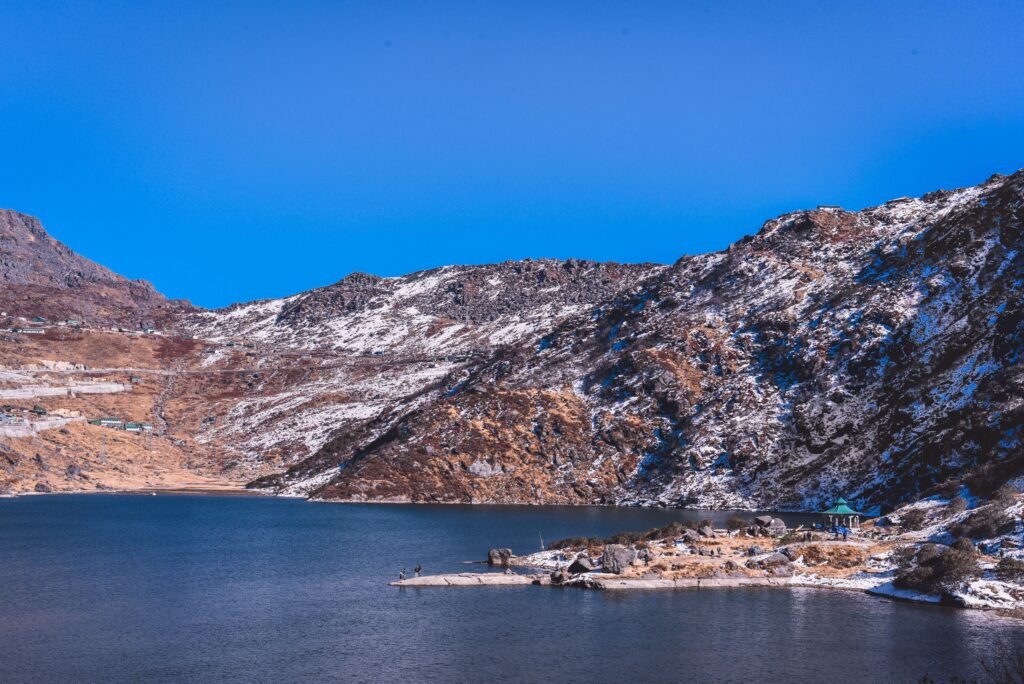 Scenic view of snow-covered mountains and lake in Gangtok, India. Perfect for nature lovers.
